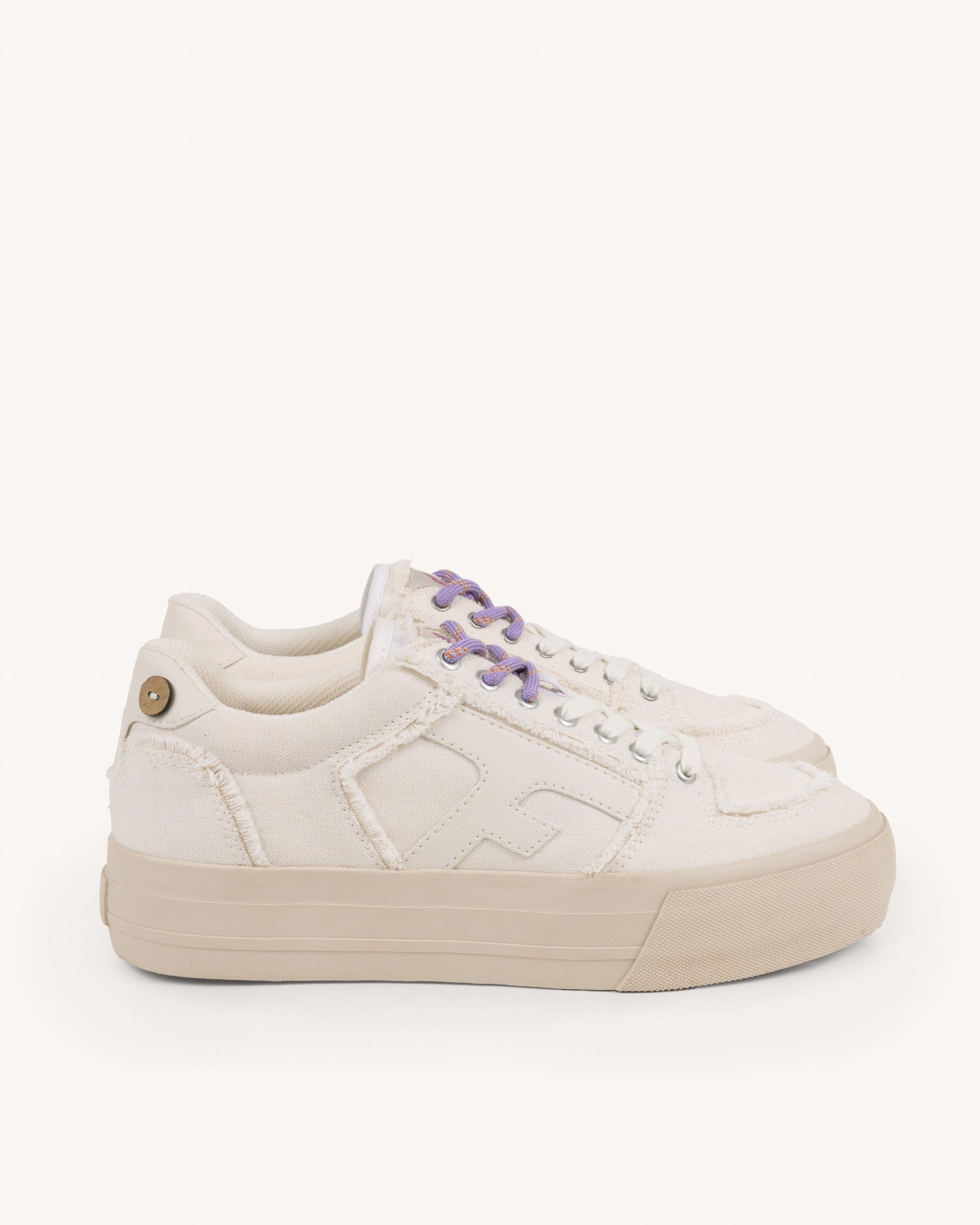 White vegan low-top trainers