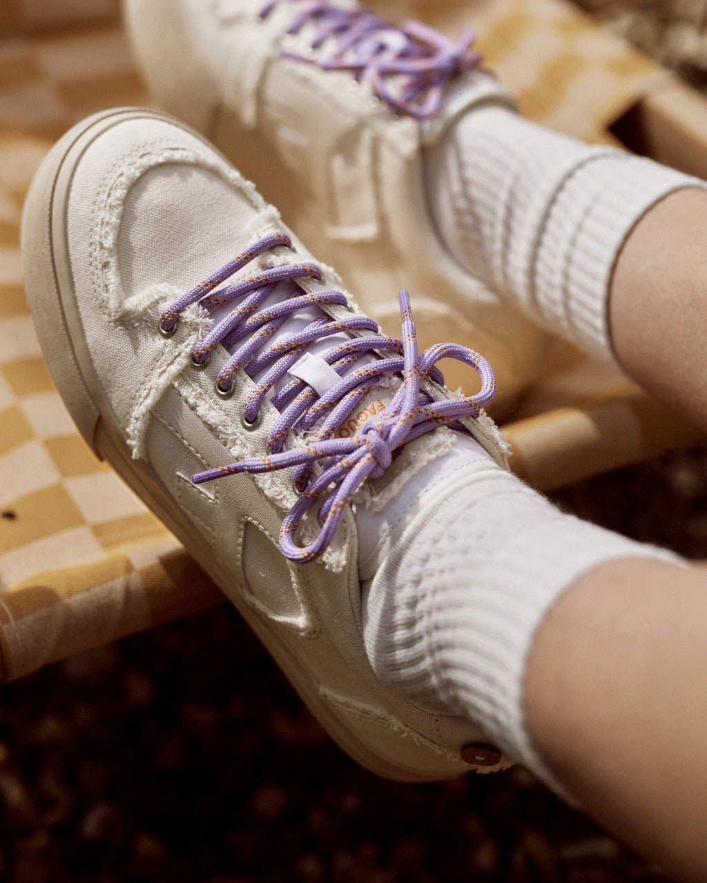 White low-top vegan trainers