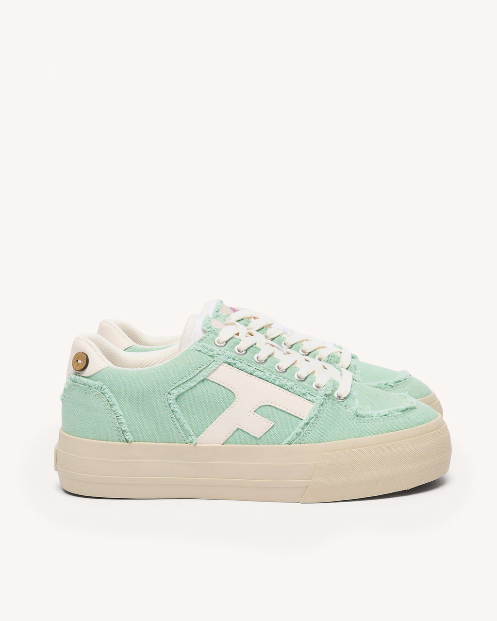 Low-top mint green vegan trainers