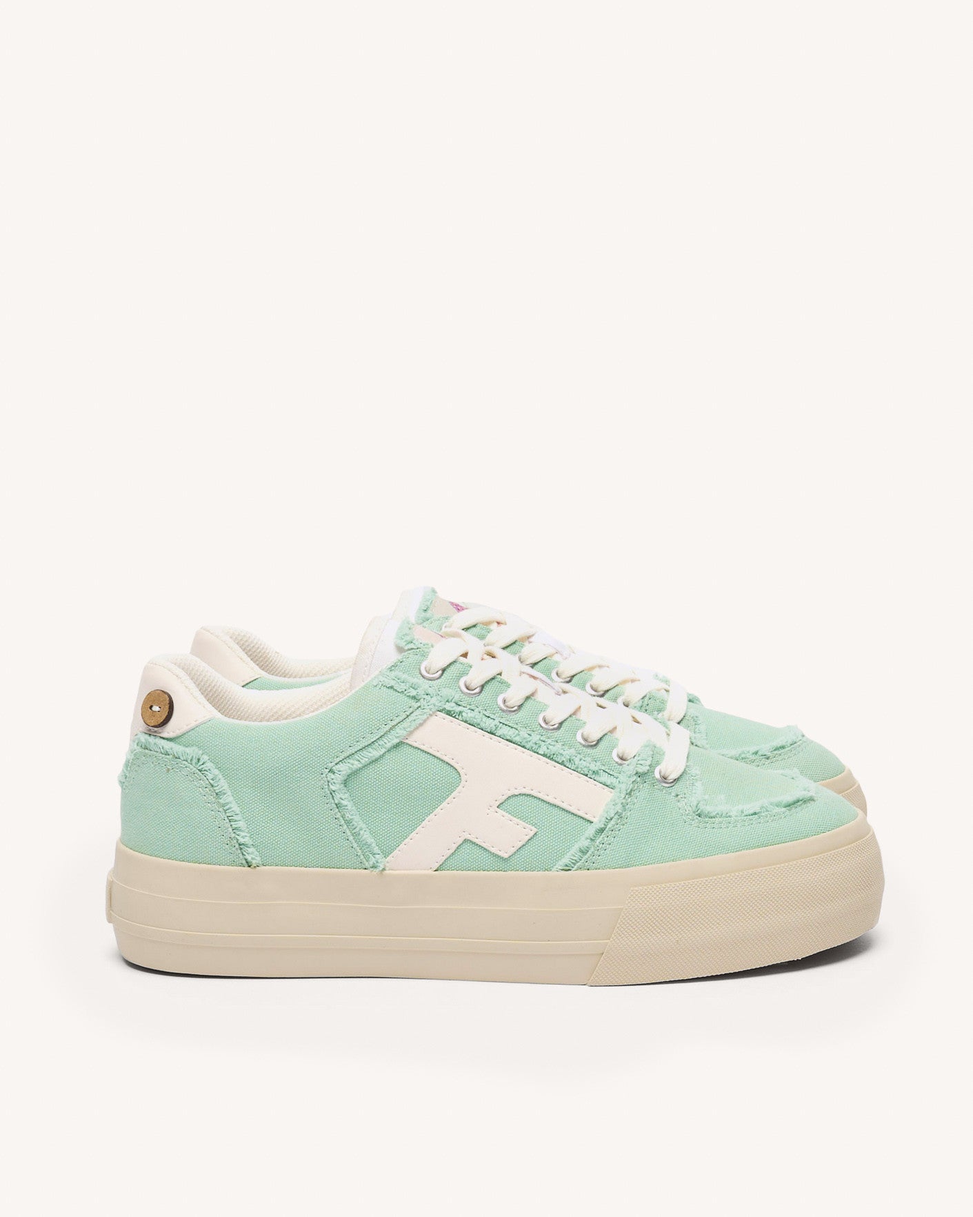Low-top mint green vegan trainers