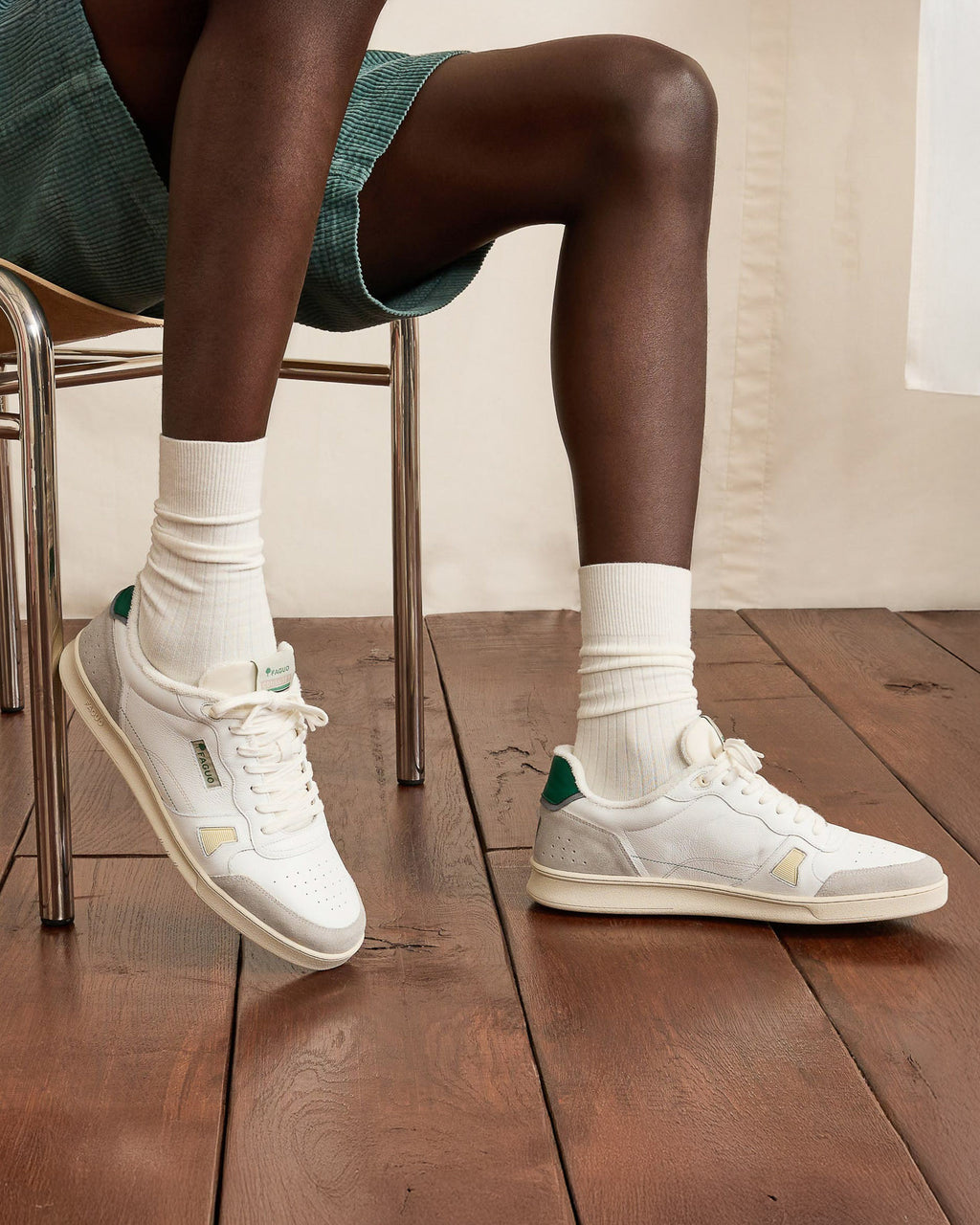 White & green low-top trainers