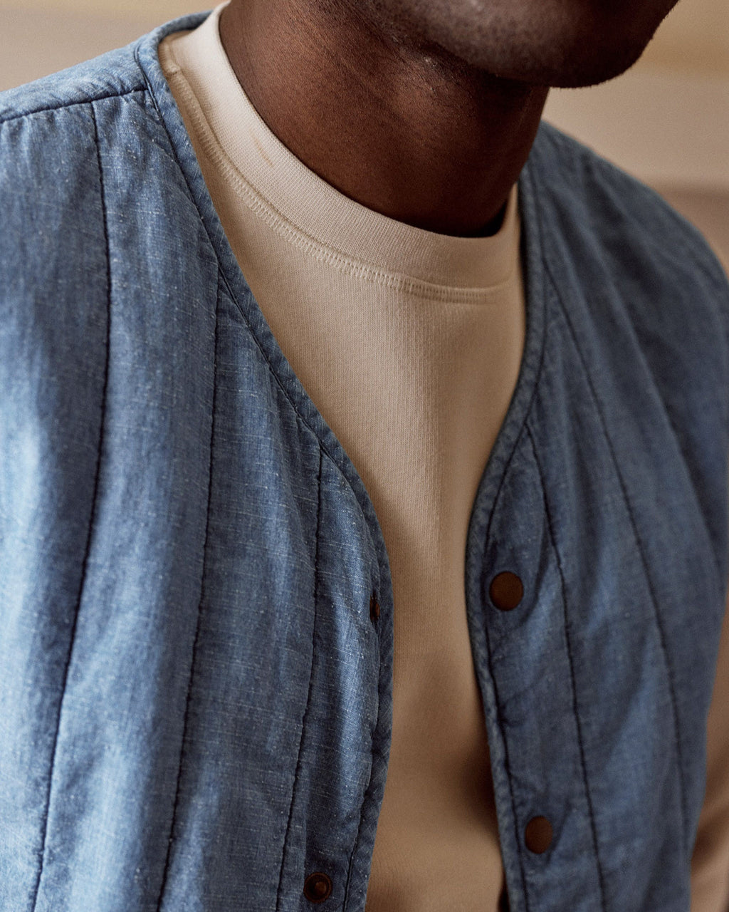 Sleeveless light denim jacket