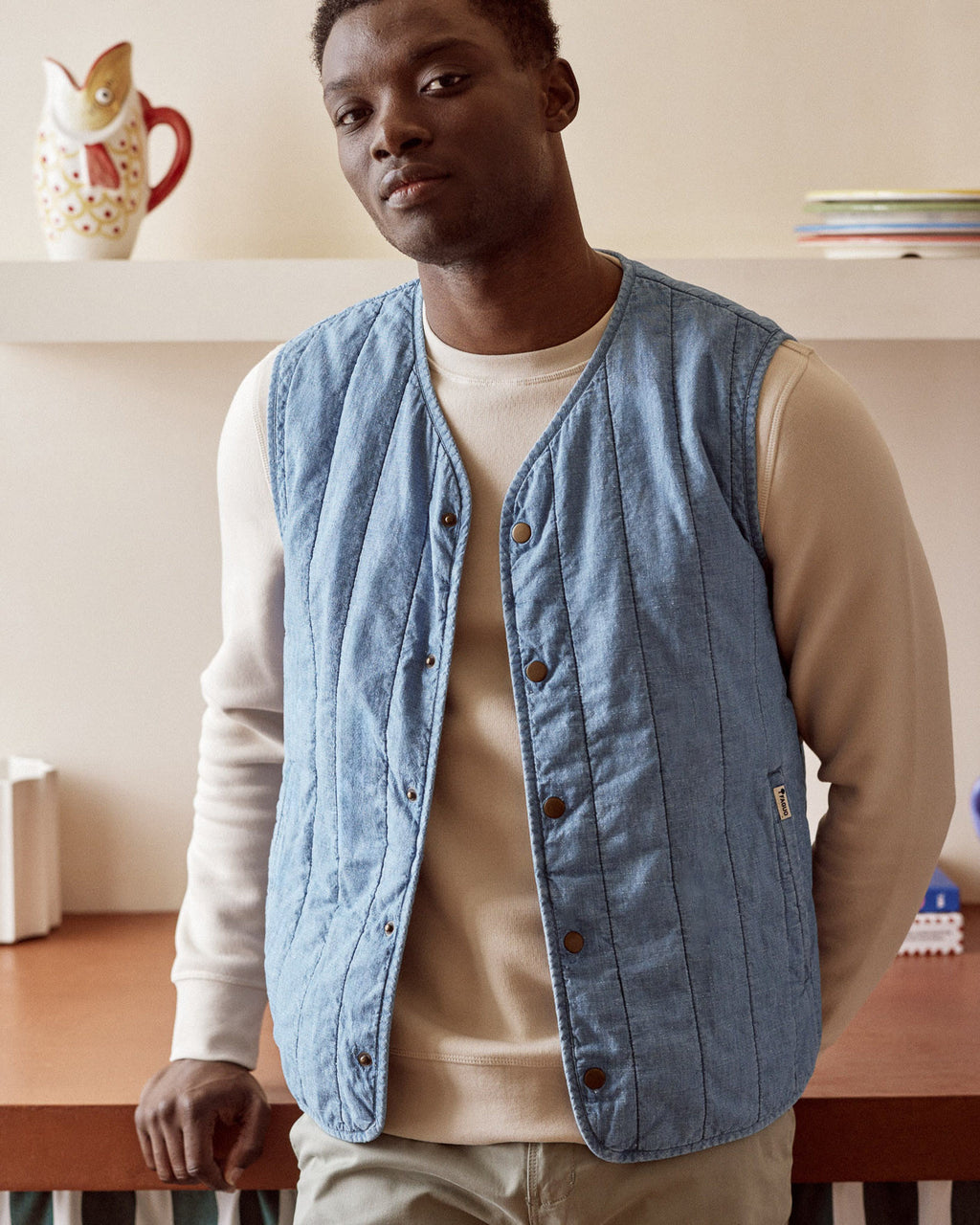 Sleeveless light denim jacket
