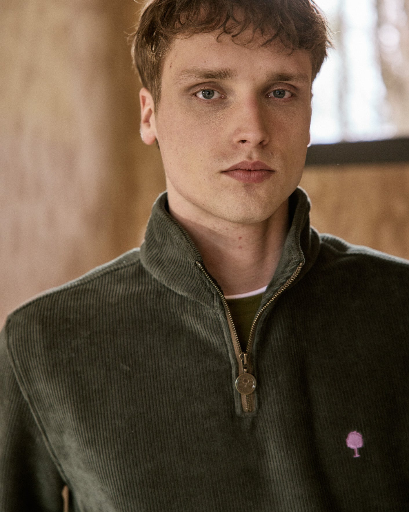 Dark olive green zip-up funnel neck sweatshirt