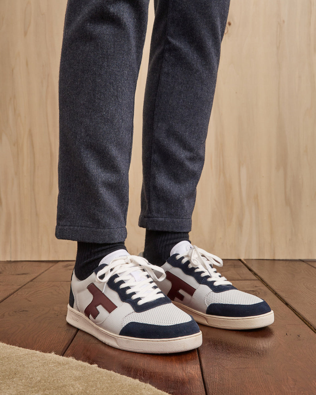 White & navy blue trainers
