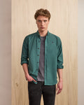 Light green shirt with tree embroidery