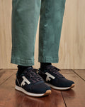 Navy blue running shoe