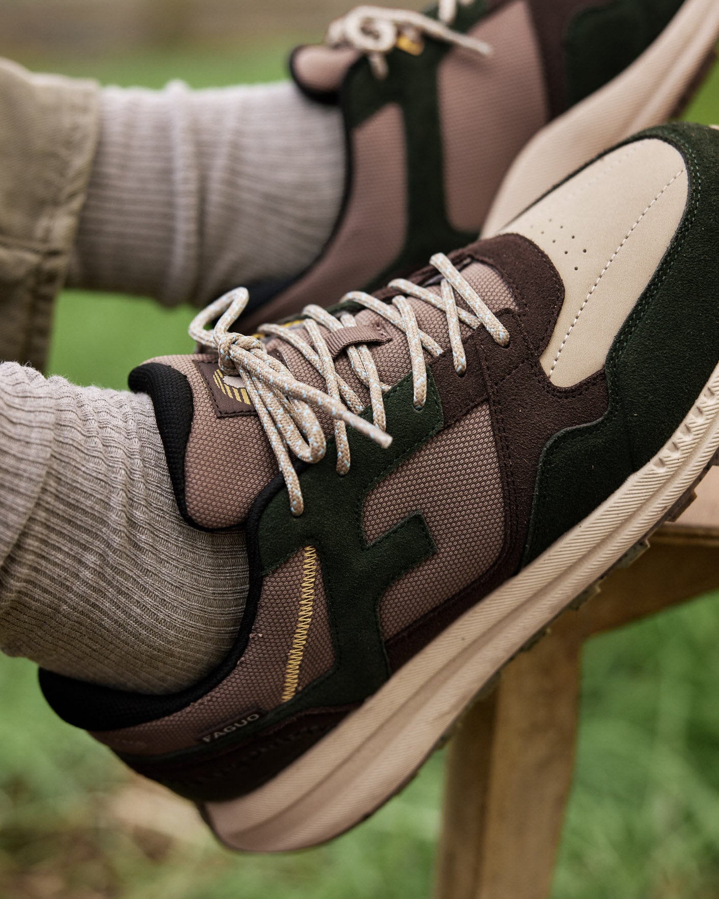 Dark green & taupe running shoe