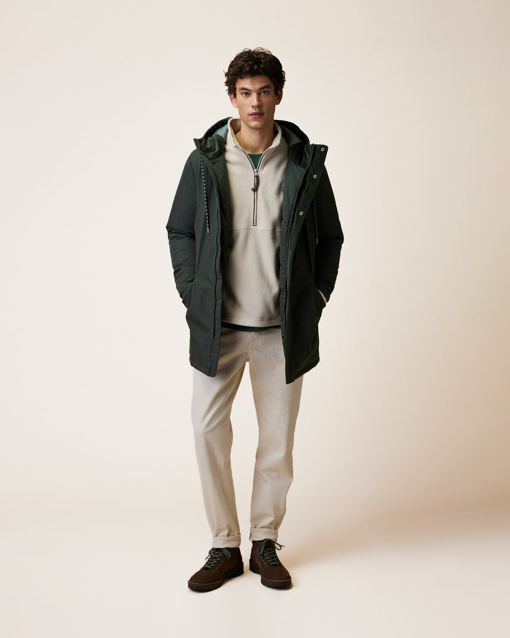 Long green waterproof parka