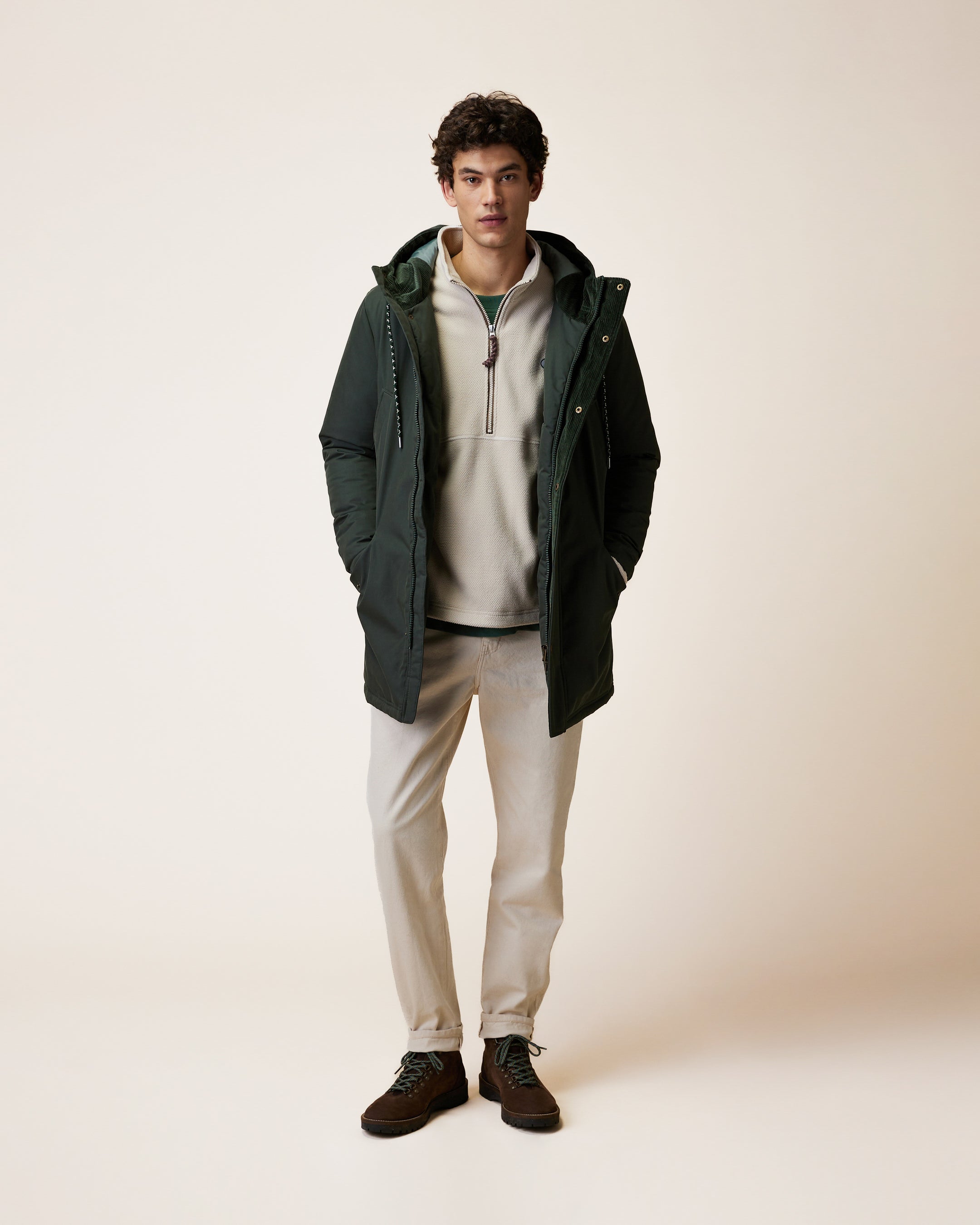 Long green waterproof parka