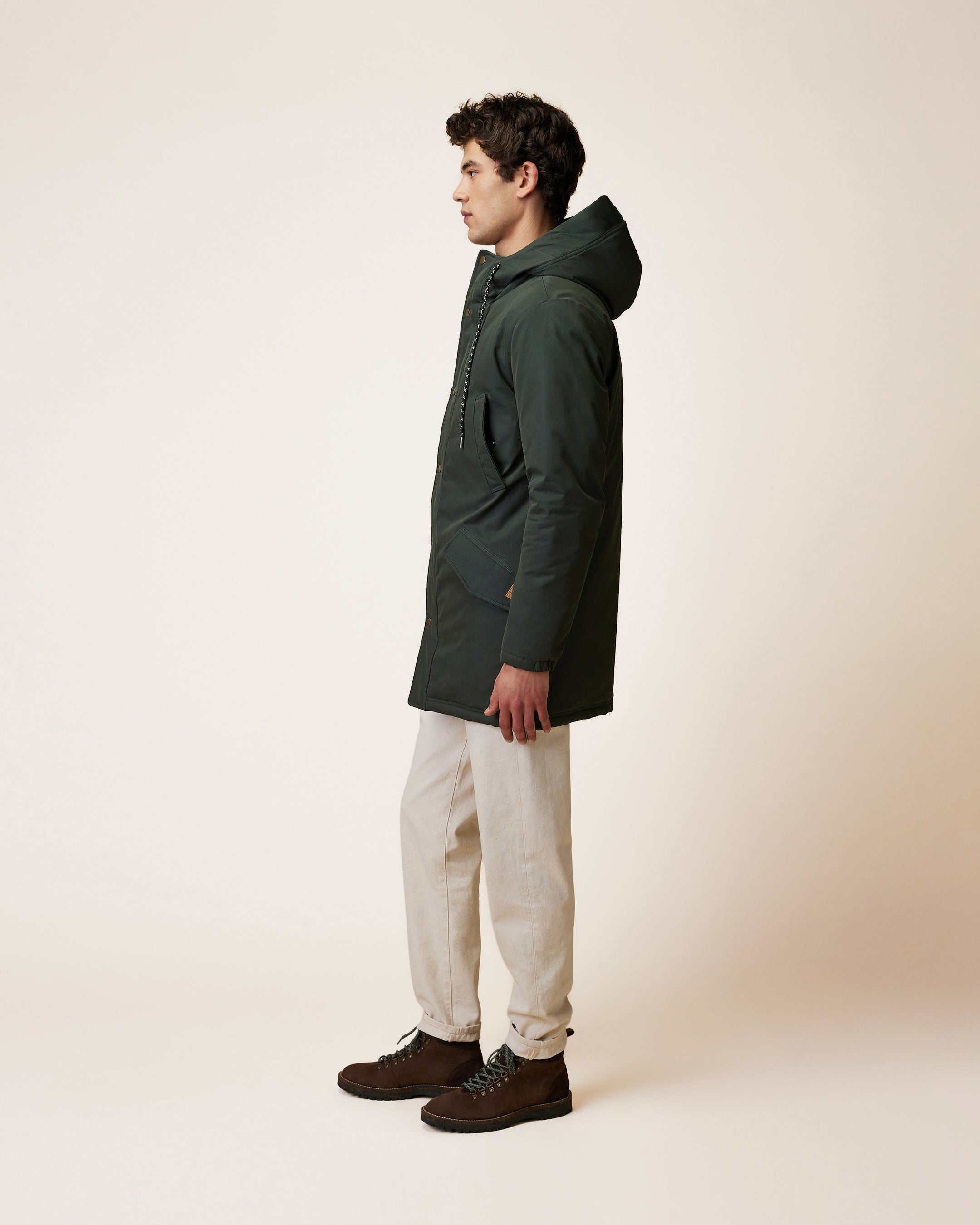 Long green waterproof parka