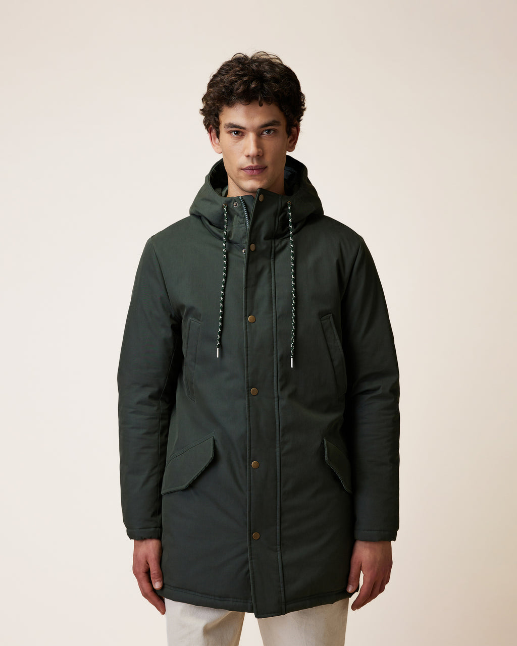 Long green waterproof parka