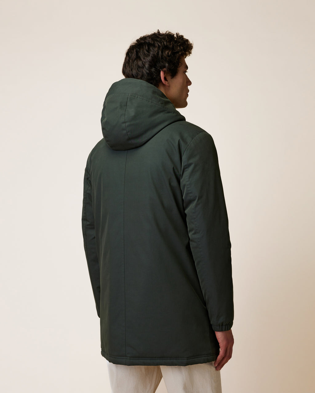 Long green waterproof parka