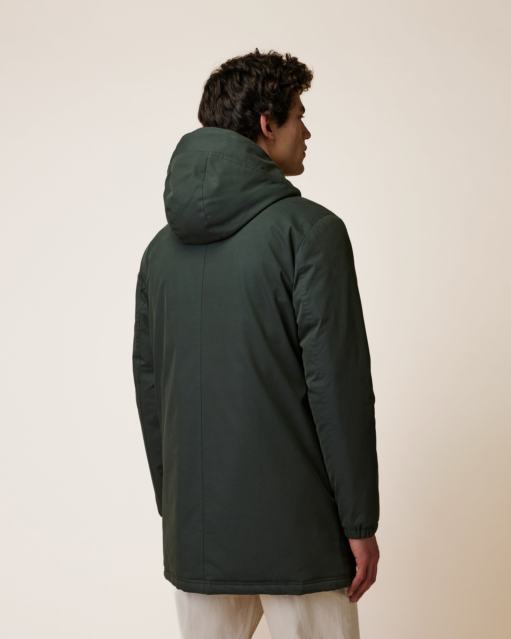 Long green waterproof parka